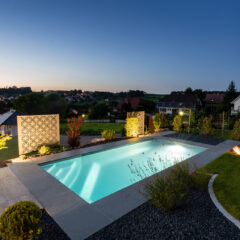 rectangular pool with dark liner at night