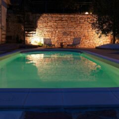 idea de iluminación de noche para una piscina Waterair