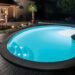piscina riñón enterrada con luces