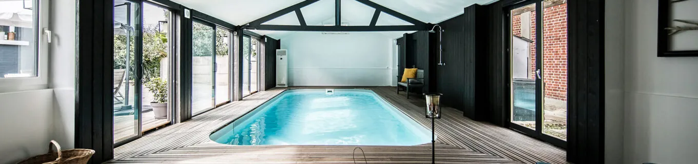 construire une piscine intérieure pour profiter tout au long de l’année des bienfaits de l’eau