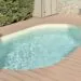 mini Piscine Olivia sur terrasse en bois avec échelle